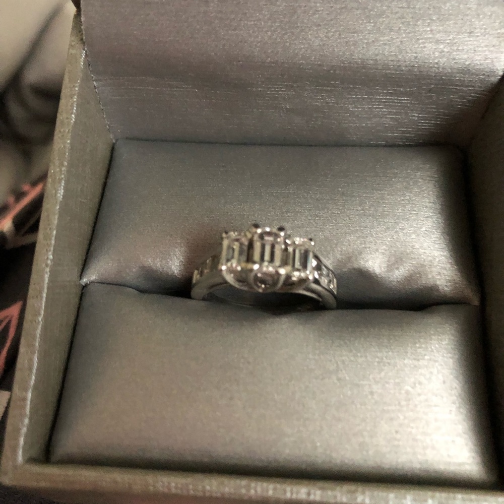 1.5 carat Emerald cut diamond ring